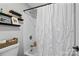 Bathroom featuring a tub with a shower head, white tile and a vanity at 1669 Mary Ellen Dr, Fort Mill, SC 29708