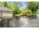 Spacious two-car garage with brick exterior and well-maintained landscaping at 1669 Mary Ellen Dr, Fort Mill, SC 29708