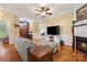 Comfortable living room with hardwood floors, fireplace, and detailed trim at 1669 Mary Ellen Dr, Fort Mill, SC 29708