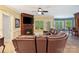 Beautiful living room featuring a fireplace, hardwood trim, and access to the dining area at 1669 Mary Ellen Dr, Fort Mill, SC 29708