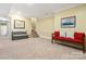 Living room with carpet flooring, large window, neutral paint and comfortable furniture at 1669 Mary Ellen Dr, Fort Mill, SC 29708