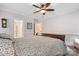 Relaxing main bedroom with tray ceilings, carpet, and natural light from side windows at 1669 Mary Ellen Dr, Fort Mill, SC 29708