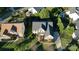 Overhead view of brick home with well-maintained landscaping and green lawn, in a desirable neighborhood at 1708 Aringill Ln, Matthews, NC 28104