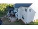 Aerial view of a backyard with a screened porch and deck, perfect for outdoor dining and entertaining at 1708 Aringill Ln, Matthews, NC 28104