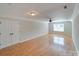 Bonus room with hardwood floors, double closet, and lots of natural light at 1708 Aringill Ln, Matthews, NC 28104