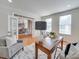 Bright home office with French doors leading to dining room, perfect for remote work at 1708 Aringill Ln, Matthews, NC 28104