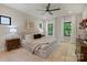 Spacious bedroom with neutral paint, natural light, and modern ceiling fan at 1711 Summey Ave, Charlotte, NC 28205