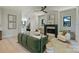 Bright living room with a black fireplace and lots of natural light with neutral paint and decor at 1711 Summey Ave, Charlotte, NC 28205