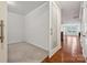 Bright bedroom with a sliding glass door entry and neutral carpeting at 17916 Ragtop Day Ln, Cornelius, NC 28031