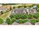Aerial view of townhomes with manicured landscaping and proximity to recreational areas at 17916 Ragtop Day Ln, Cornelius, NC 28031
