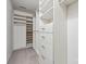 Spacious walk-in closet with ample shelving and hanging space for organized storage at 17916 Ragtop Day Ln, Cornelius, NC 28031