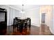 Formal dining room with hardwood floors and a classic chandelier, perfect for Gathering gatherings at 1821 Sherrer Rd, York, SC 29745