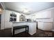Modern kitchen featuring white cabinets, granite countertops, stainless appliances and ample counter space at 1821 Sherrer Rd, York, SC 29745