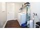 A bright laundry room with a washer and dryer, and storage at 1821 Sherrer Rd, York, SC 29745