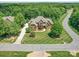 This house has mature landscaping and a circular driveway at 200 Waterby Way, Matthews, NC 28104