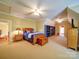 Large bedroom featuring hardwood furniture, an ensuite and neutral carpeting at 200 Waterby Way, Matthews, NC 28104