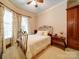 Bright bedroom with neutral walls, carpet, and a decorative window treatment at 200 Waterby Way, Matthews, NC 28104