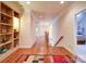 Hallway with hardwood floors and a view of multiple bedrooms at 200 Waterby Way, Matthews, NC 28104