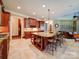 Gourmet kitchen with a large island, stainless steel appliances, and custom cabinetry at 200 Waterby Way, Matthews, NC 28104