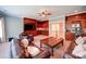 Living room featuring custom cabinets, granite countertops and an open doorway at 200 Waterby Way, Matthews, NC 28104