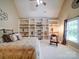 Bright main bedroom with built-in shelves and a window seat provides natural light at 200 Waterby Way, Matthews, NC 28104