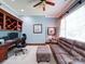 Well-appointed office with built-in shelving, ample workspace, and comfortable seating at 200 Waterby Way, Matthews, NC 28104