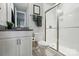 Modern bathroom featuring a glass-enclosed shower, white subway tiles, and granite vanity at 2062 Nellies Way, Fort Mill, SC 29715