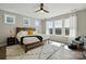 Relaxing bedroom with a comfortable bed, soft rug and a view to the outside at 2062 Nellies Way, Fort Mill, SC 29715