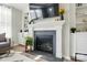 Close up of the fireplace featuring built-ins and modern decor at 2062 Nellies Way, Fort Mill, SC 29715