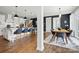 Modern kitchen with an island, breakfast bar, and adjacent dining area at 2062 Nellies Way, Fort Mill, SC 29715