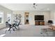 Spacious living area with a dining table, entertainment center, and ample seating at 2062 Nellies Way, Fort Mill, SC 29715