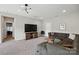 Bright living room featuring a sectional, entertainment center, and modern furnishings at 2062 Nellies Way, Fort Mill, SC 29715