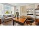 Bright office area with hardwood floors, a large desk, and comfortable seating at 2062 Nellies Way, Fort Mill, SC 29715