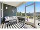 Relaxing screened porch with comfortable seating and an outdoor view at 2062 Nellies Way, Fort Mill, SC 29715