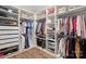 Spacious walk-in closet with custom organization systems, including shelves, rods, and baskets at 2062 Nellies Way, Fort Mill, SC 29715