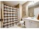 Bathroom with neutral colored walls, shower curtain, and vanity at 208 Mcduffie Ln, Fort Mill, SC 29715