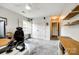 Office with neutral carpet, bright light, and floating shelves at 208 Mcduffie Ln, Fort Mill, SC 29715