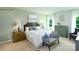 Comfortable bedroom featuring a large bed, stylish decor, and natural light creates a relaxing and inviting space at 227 Paige Rd, Kings Mountain, NC 28086