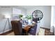 Elegant dining room with a modern chandelier, a large dining table, and seating for six at 227 Paige Rd, Kings Mountain, NC 28086