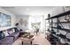 Bright living room with modern decor, comfortable seating, and natural light from the large window creates a welcoming atmosphere at 227 Paige Rd, Kings Mountain, NC 28086