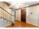 Elegant foyer with hardwood floors, staircase, and classic front door with sidelights enhancing the home's charm at 2330 Raven Dr, Rock Hill, SC 29732