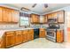 Well-lit kitchen area featuring ample cabinetry, countertops, and stainless appliances at 2330 Raven Dr, Rock Hill, SC 29732