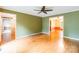 Bright living space featuring hardwood floors, a ceiling fan, and transitions to other rooms, perfect for entertaining at 2330 Raven Dr, Rock Hill, SC 29732