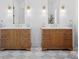 Bright bathroom featuring dual vanities with marble countertops, modern lighting, and a tiled floor at 2370 Bridgewater Rd, Rock Hill, SC 29730