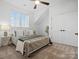 Bright bedroom featuring a large window and neutral decor at 2370 Bridgewater Rd, Rock Hill, SC 29730