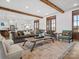 Spacious living room with wood beams, hardwood floors, and many windows at 2370 Bridgewater Rd, Rock Hill, SC 29730