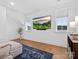 Bright living room with a large TV, comfortable sofa, and views of the landscape at 2370 Bridgewater Rd, Rock Hill, SC 29730