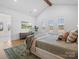 Bright main bedroom featuring high ceilings, hardwood floors, and large windows with shutters at 2370 Bridgewater Rd, Rock Hill, SC 29730
