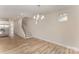 Bright living area with wood floors, stairway access and an eat-in kitchen at 2818 Old Steele Creek Rd, Charlotte, NC 28208