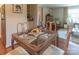 Dining room with hardwood floors, a glass table, and seating for four people at 3008 Imperial Dr, Gastonia, NC 28054